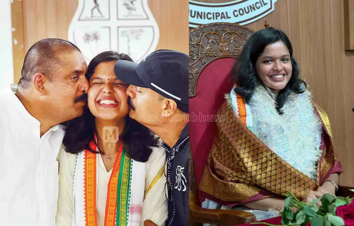 പാലാ നഗരസഭയിൽ ചുമതലയേറ്റ ദിയാ ബിനുവിന് സ്നേഹചുംബനം നൽകുന്ന അച്ഛൻ ബിനു പുളിക്കക്കണ്ടവും പിതൃസഹോദരൻ ബിജുവും| ഫോട്ടോ: ജി. ശിവപ്രസാദ്