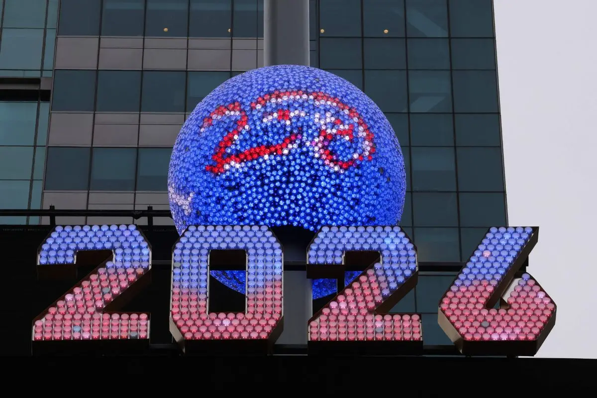 Seven-foot-tall numerals for "2026" are displayed during an illumination ceremony on December 26, 2025 at One Times Square in New York City, ahead of the this year's New Year's Eve celebration in Times Square. (Photo by TIMOTHY A. CLARY / AFP)