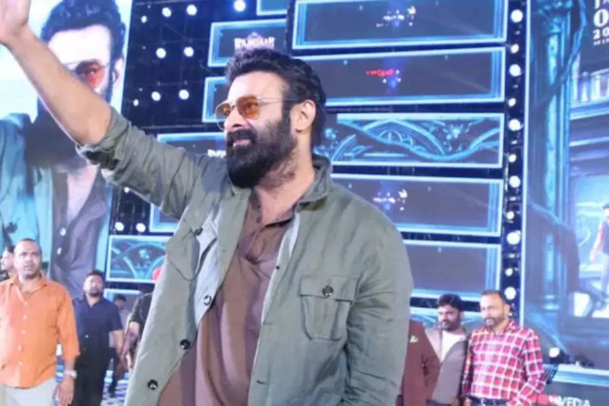 Prabhas addresses fans at the grand pre-release event of 'The Raja Saab' in Hyderabad, teasing a powerful climax and sending excitement levels soaring. Photo: X