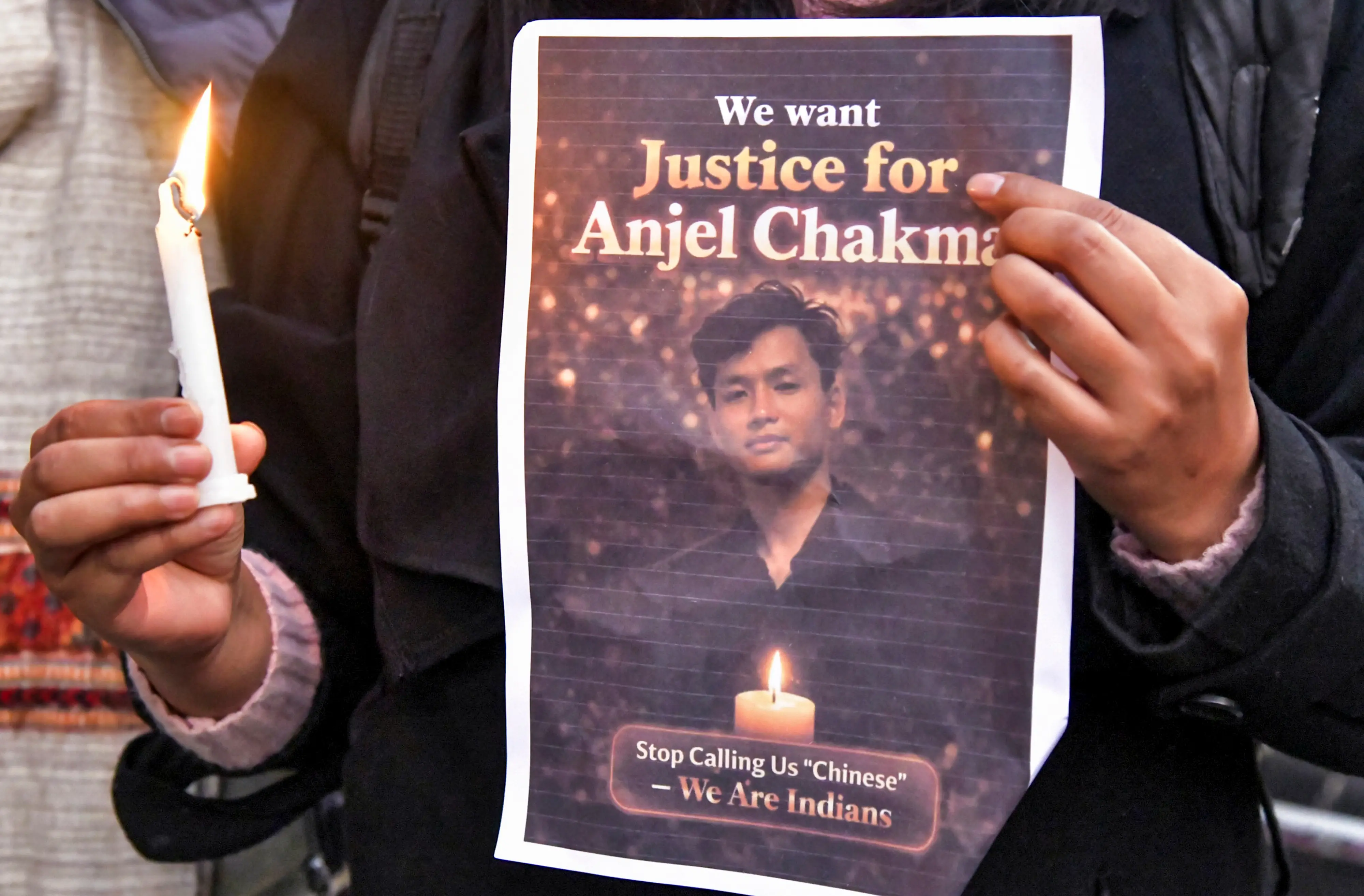Members of students' organisations and locals participate in a candlelight march at Gandhi Park protesting the assault and death of Tripura student Angel Chakma, in Dehradun | PTI