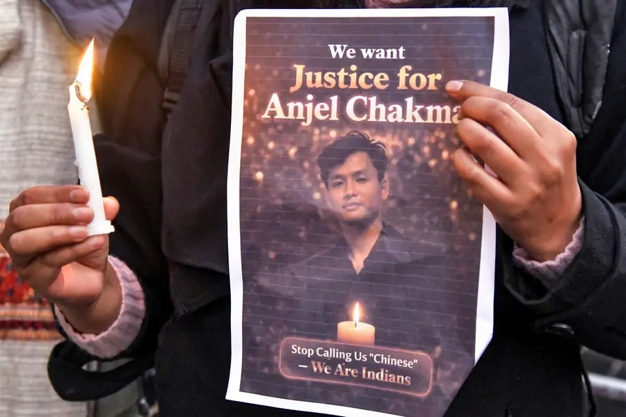 Members of students' organisations and locals participate in a candlelight march at Gandhi Park protesting the assault and death of Tripura student Angel Chakma, in Dehradun | PTI