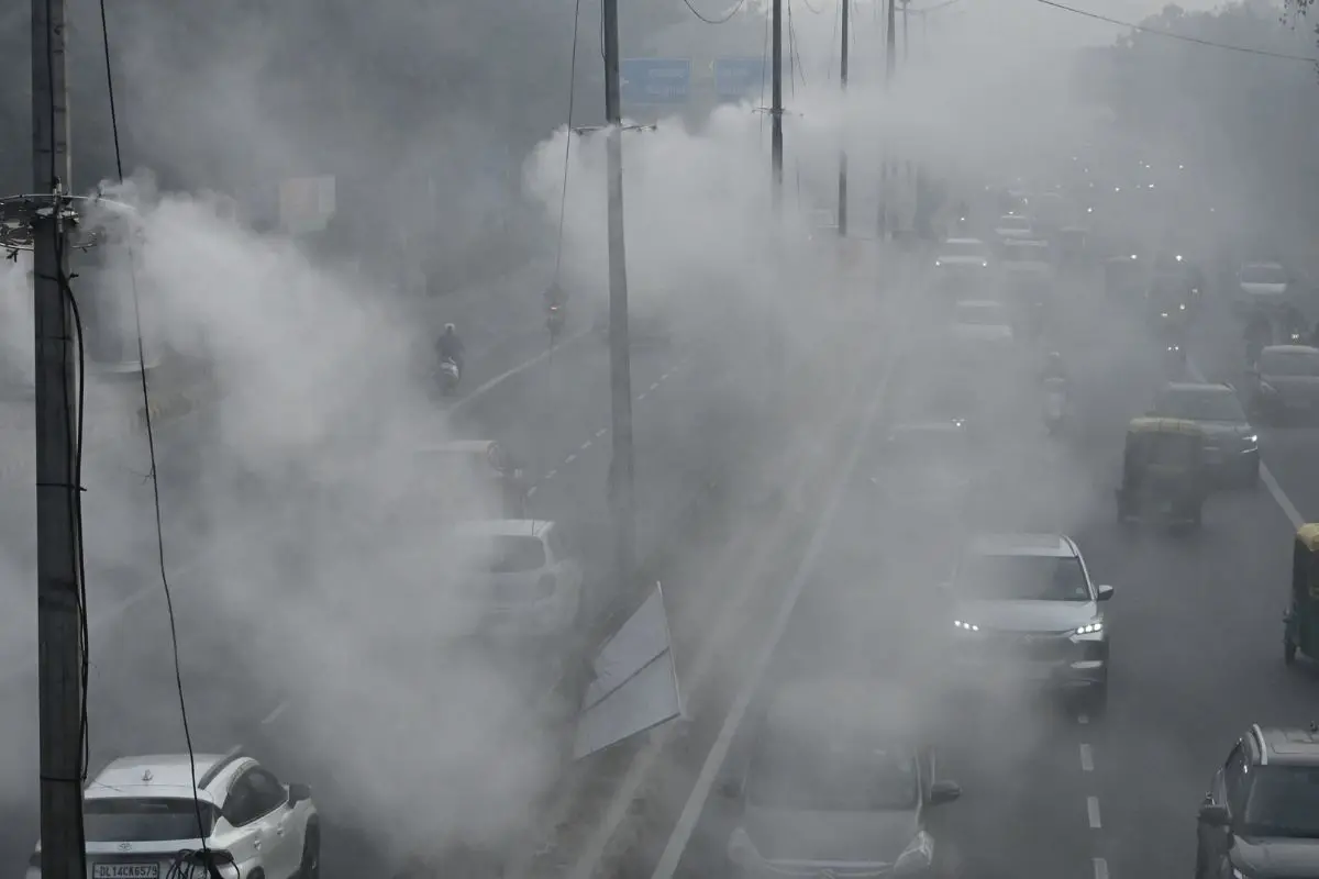 A pole-mounted mist spray system operates to mitigate pollution as air quality in the city remains very poor, in New Delhi. (ANI Photo/Jitender Gupta)