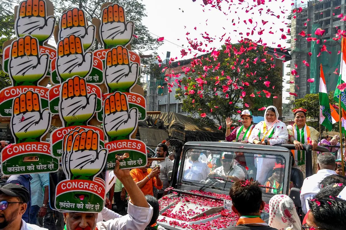 Congress candidate during a road show for the upcoming BMC election, in Mumbai, Monday, Dec. 29, 2025. (PTI Photo)