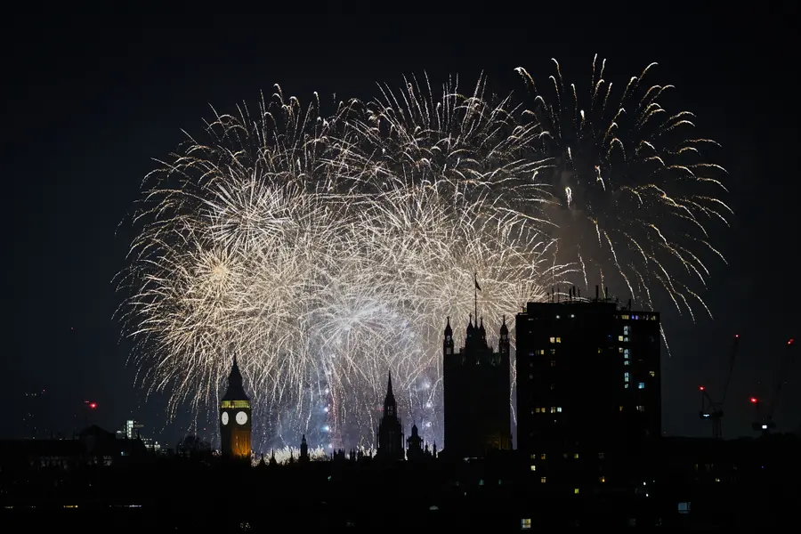 Fireworks light-up the sky in central London to celebrate the New Year on Thursday,