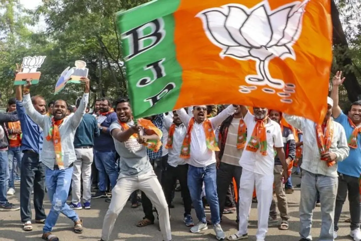 Supporters of the BJP-led Mahayuti celebrate after the ruling alliance secured 68 municipal seats unopposed across Maharashtra, even before polling day, following the withdrawal of opposition candidates ahead of the January 15 civic elections.