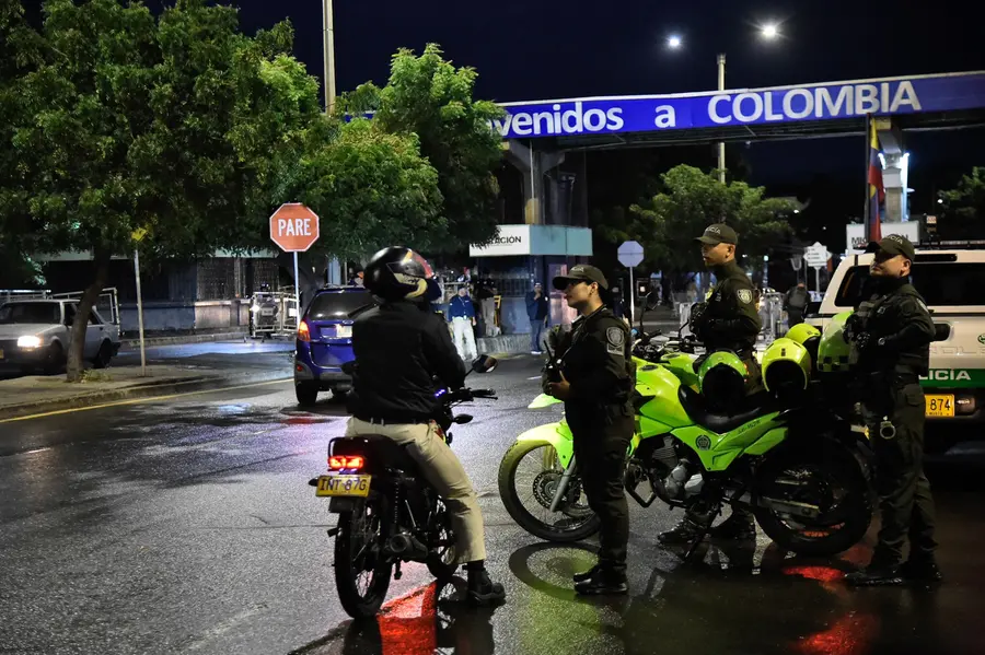 Colombian Police officers stand guard in Cucuta, at a border crossing with neighbouring Venezuela | AFP