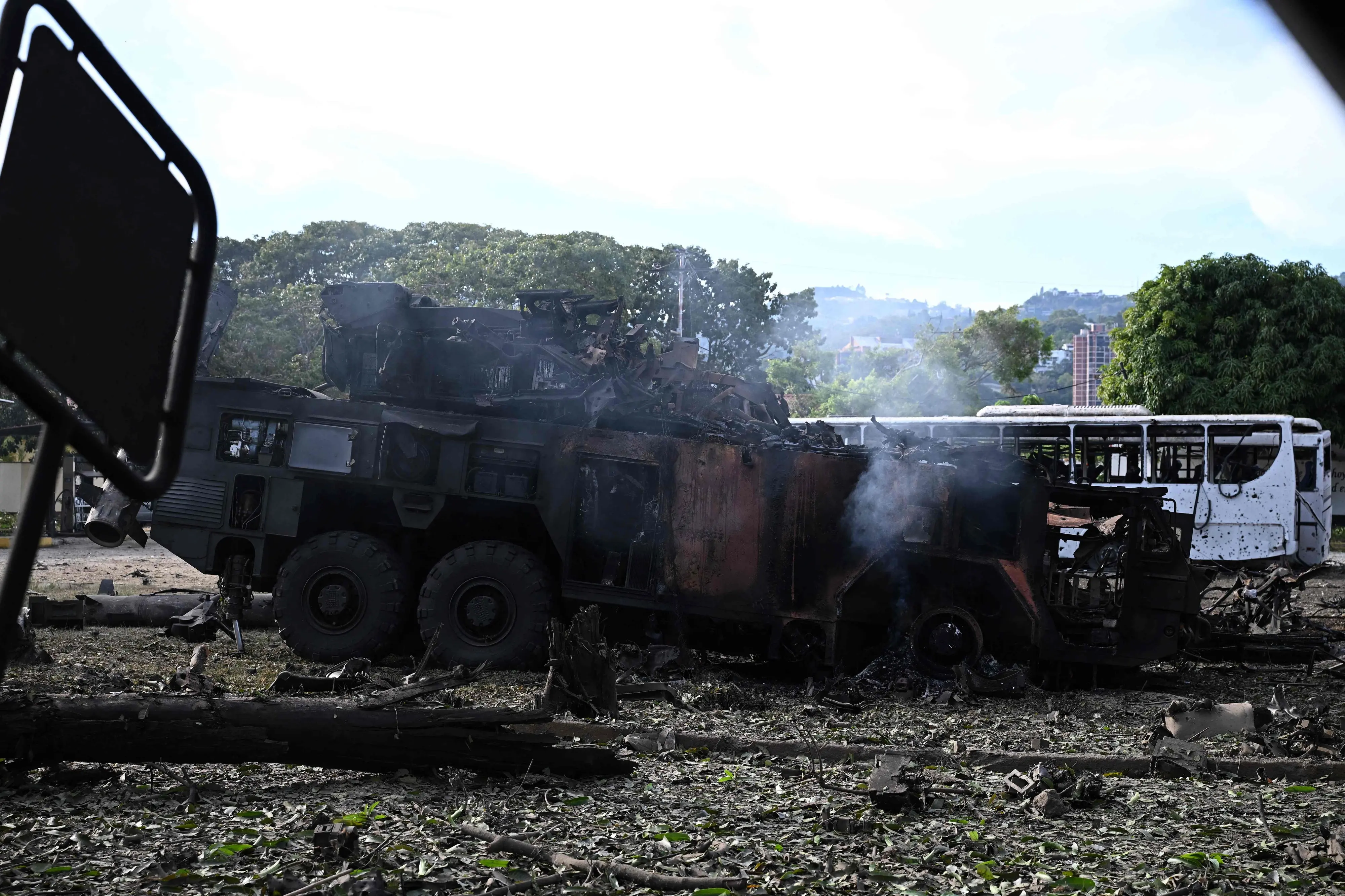 A burnt missile interceptor vehicle is seen at La Carlota air base in Caracas on January 3 | Photo: AFP