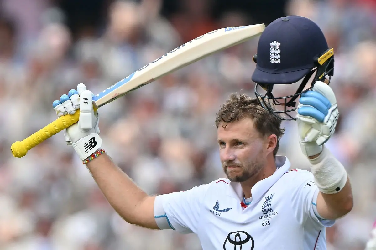 England's Joe Root celebrates reaching his century (100-runs) on day two of the fifth Ashes cricket Test match between Australia and England at the Sydney Cricket Ground (SCG). | Photo: AFP