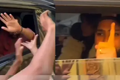 Hitman loses cool as fans pull his hand for selfies in moving car