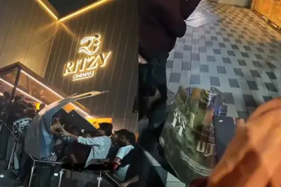 Pongal clash: Thalapathy fans allegedly tear off Parasakthi posters outside theatre | WATCH