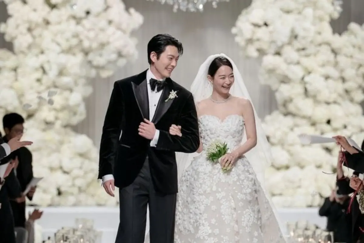 Newlyweds Shin Min Ah and Kim Woo Bin share a quiet, elegant moment during their private wedding ceremony in Seoul on December 20, 2025.
