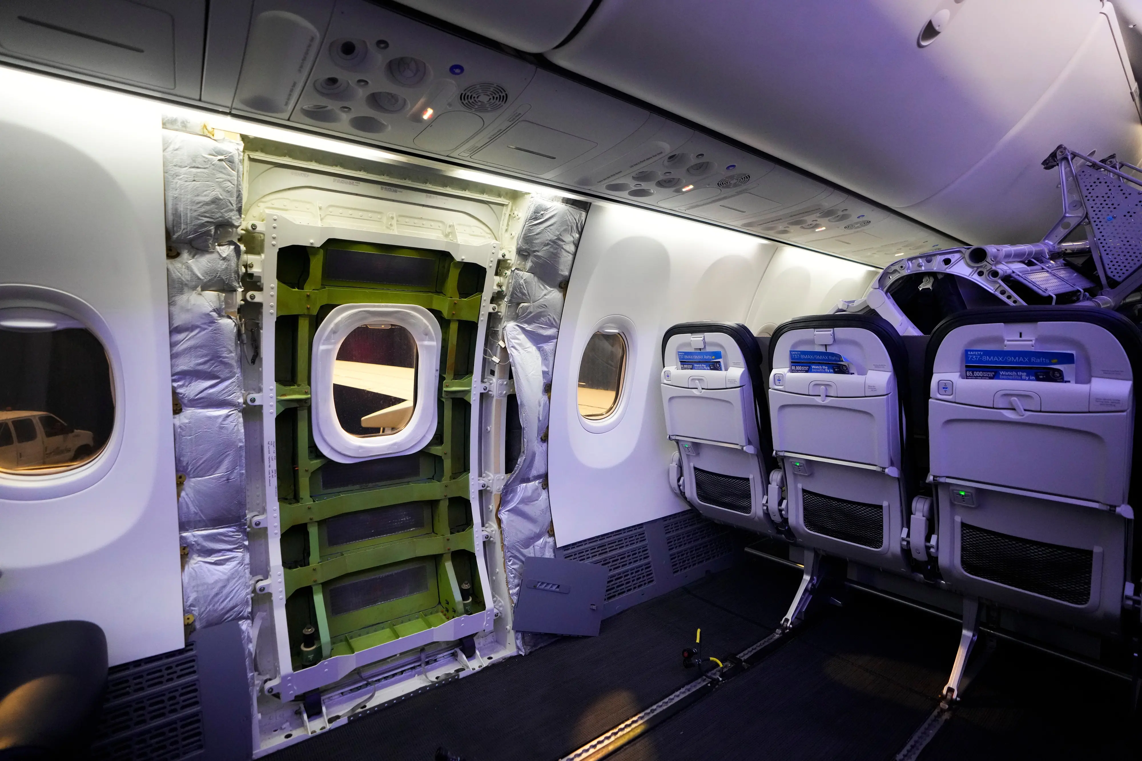 A door plug area of an Alaska Airlines Boeing 737 Max 9 aircraft awaiting inspection is pictured with panelling removed at the airline's facilities at Seattle-Tacoma International Airport on Jan. 10, 2024, in SeaTac, Wash. (AP Photo/Lindsey Wasson, File)