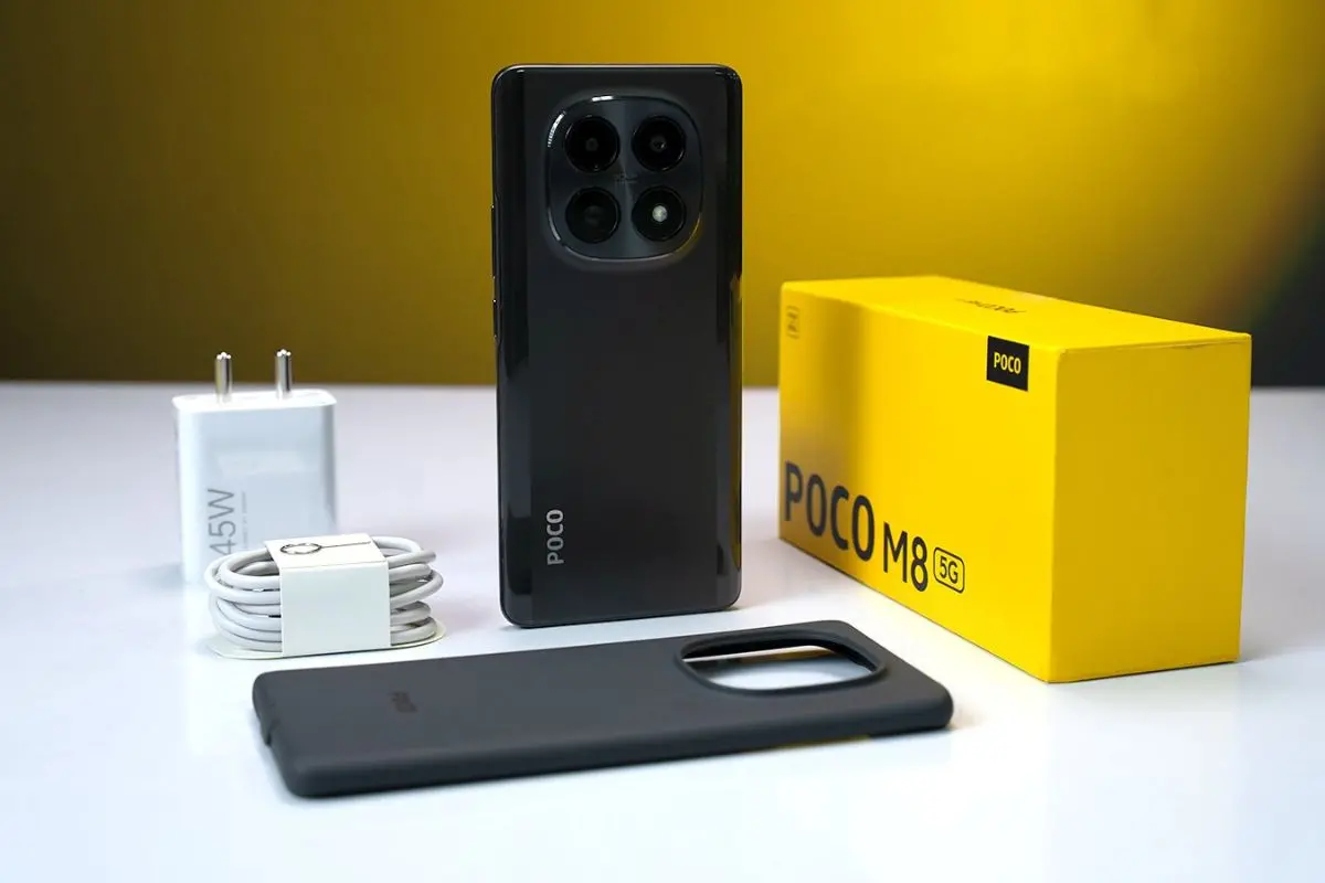 Poco M8 5G showcased in Carbon Black, featuring an AMOLED display and dual rear camera setup.