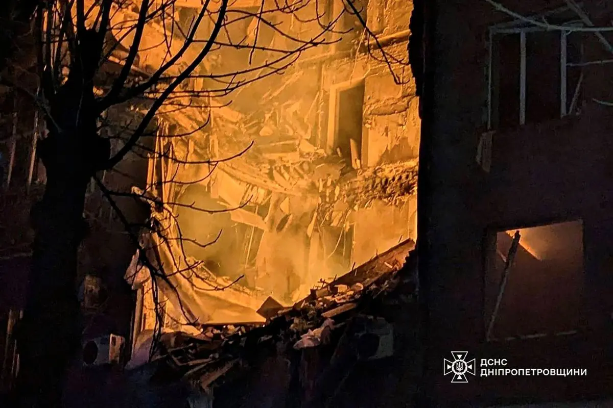 A heavily damaged residential building during a fire following a Russian missile attack | Photo: AFP