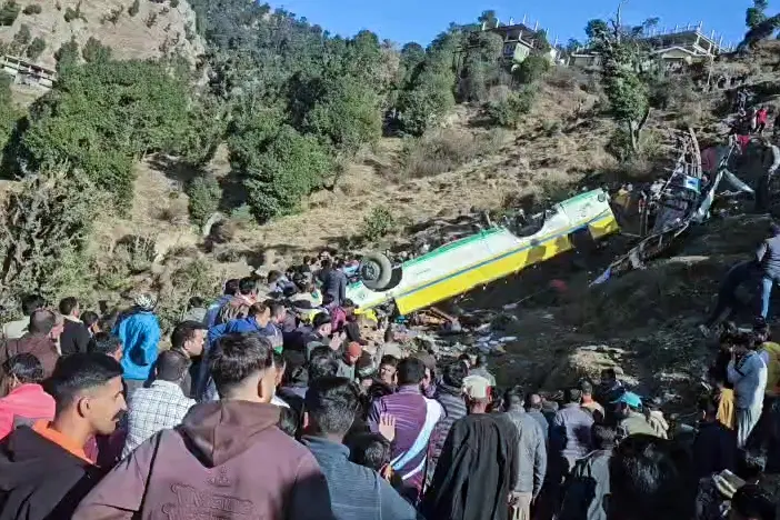 Passengers are rescued after a private bus en route from Kupvi to Shimla rolls down the road near Haripurdhar in Sirmaur