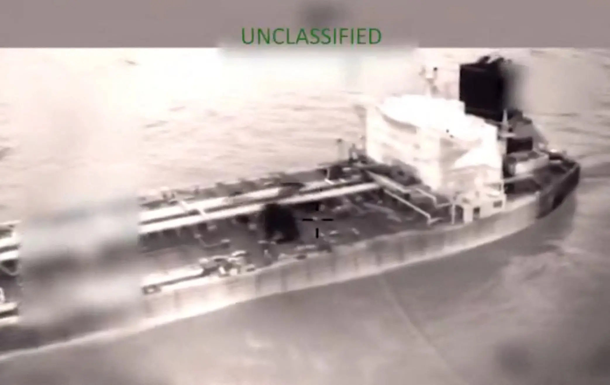 This frame grab from a video posted on US Secretary of Homeland Security Kristi Noem's X account obtained on January 9, 2025, shows what she says is the US Coast Guard boarding and seizing the tanker Olina in international waters east of the Caribbean Sea on January 9, 2026. | Photo: AFP