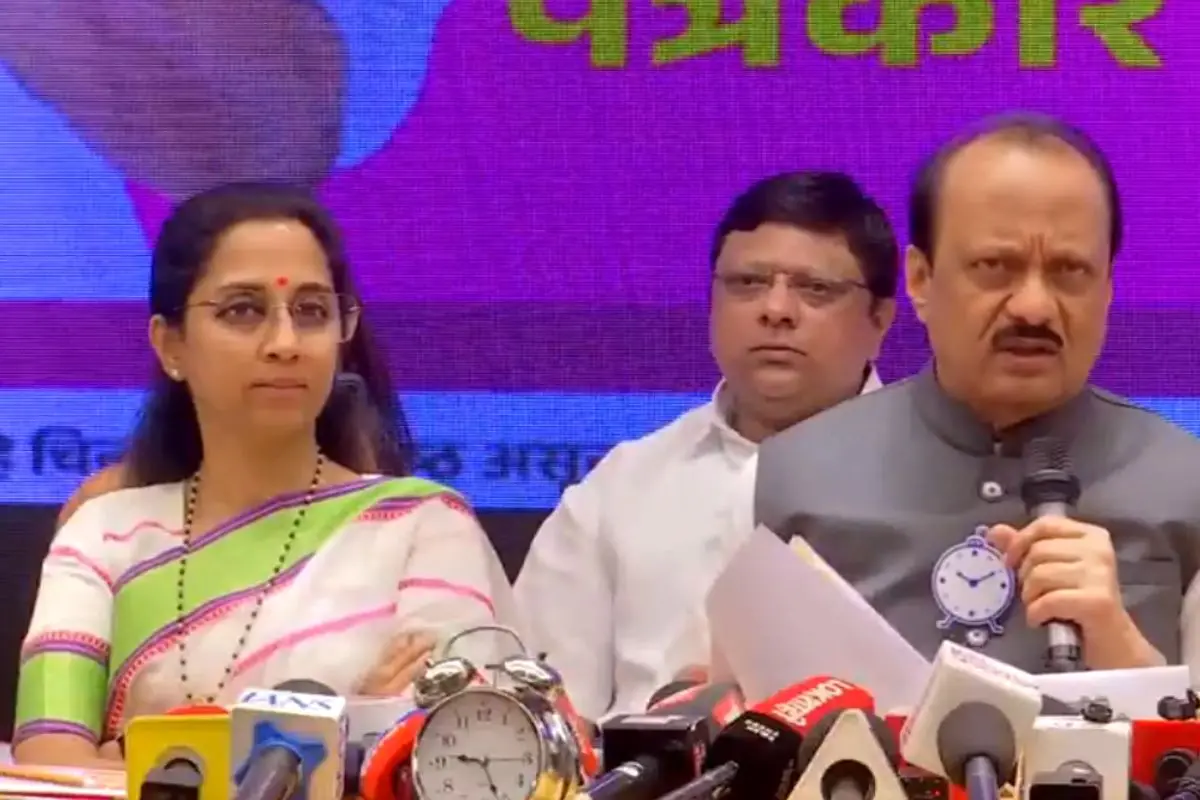 Ajit Pawar and Supriya Sule share the stage at the joint manifesto launch for the Pune civic elections, marking a rare and historic moment of unity between rival NCP factions. (ANI Screengrab)