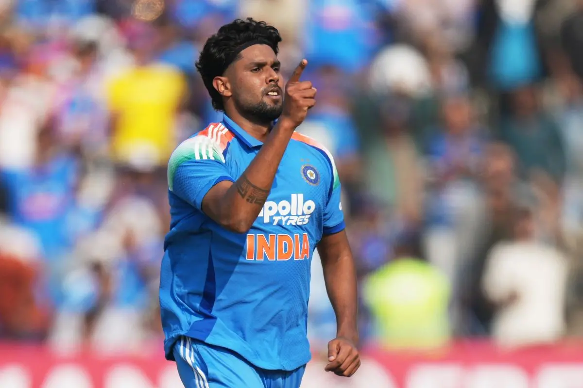 Harshit Rana celebrates the wicket of New Zealand's Devon Conway. (AP Photo/Ajit Solanki)
