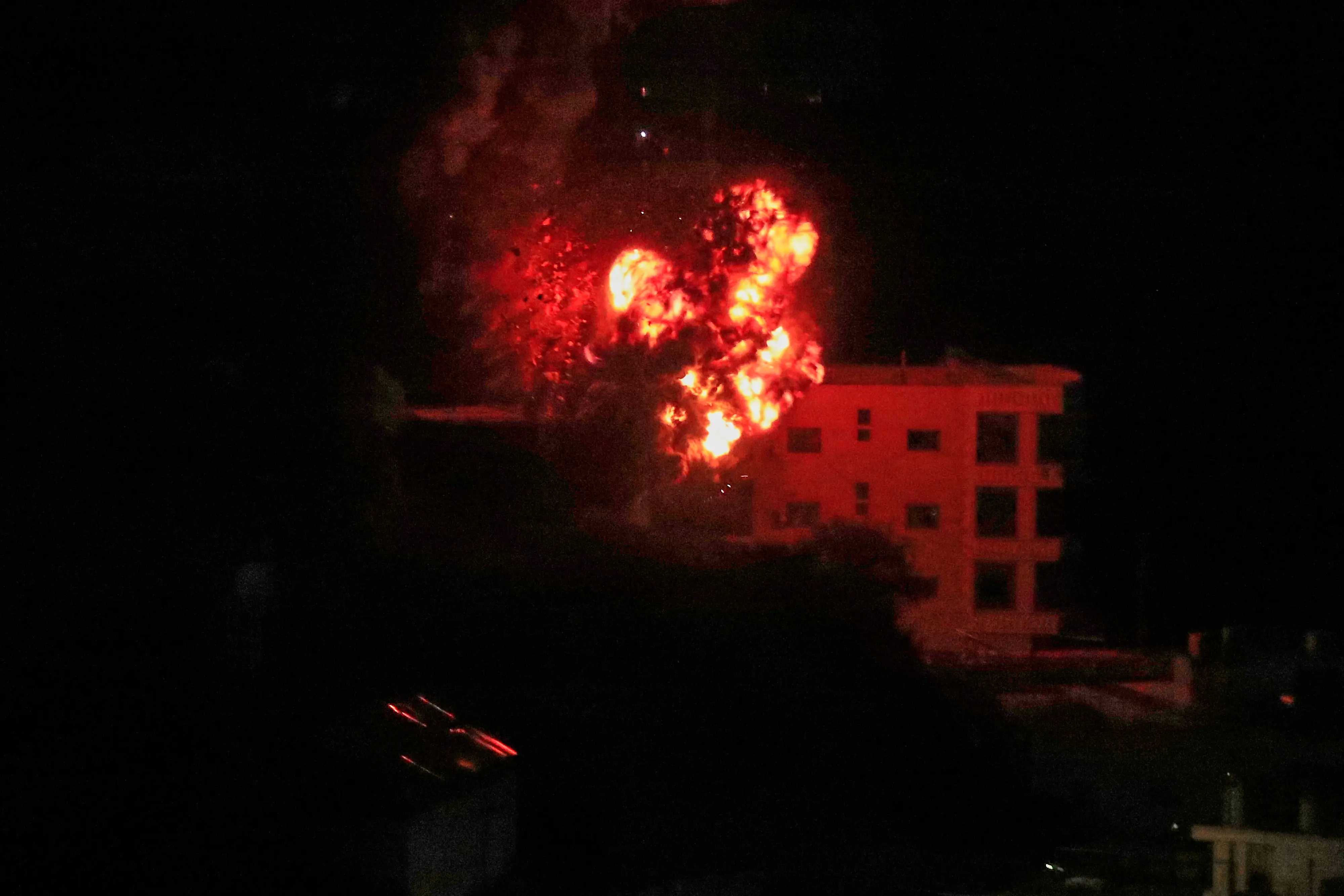 Flames rise from an Israeli airstrike that hit a building in the village of Kfar Hatta, south Lebanon | Photo:AP