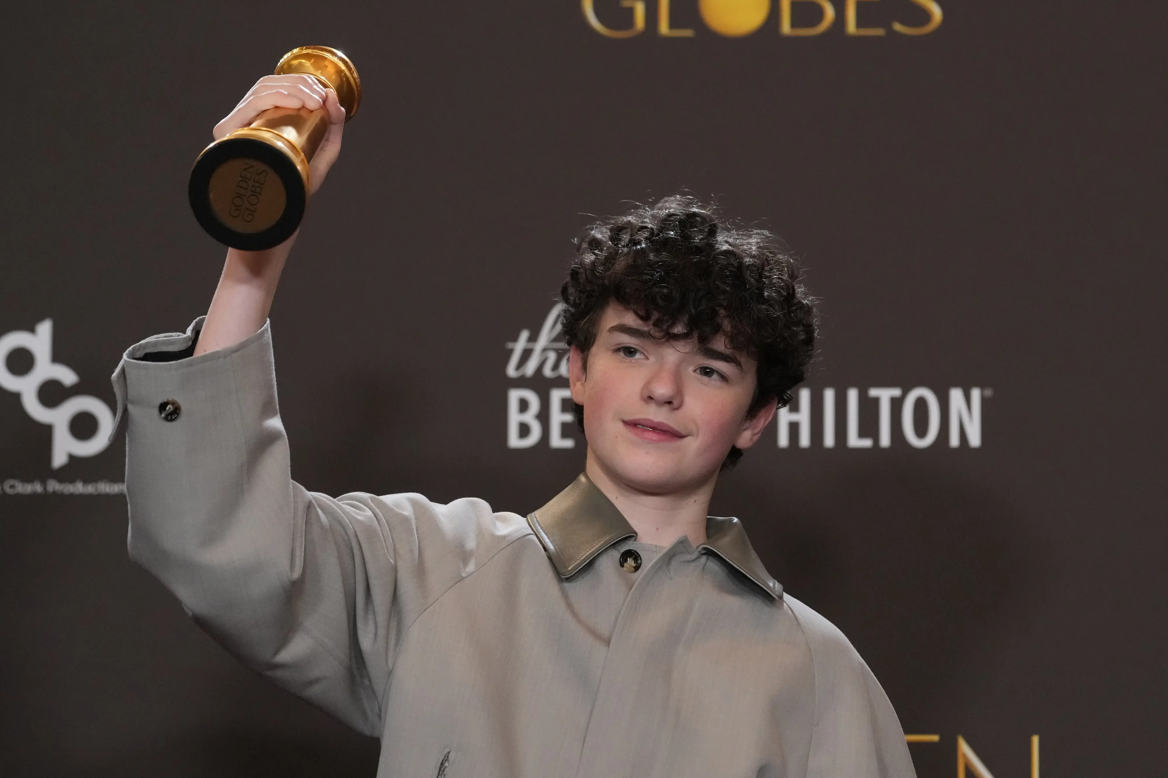 Owen Cooper poses in the press room with the award for best performance by a male supporting actor in a television series for "Adolescence" during the 83rd Golden Globes | AP/PTI