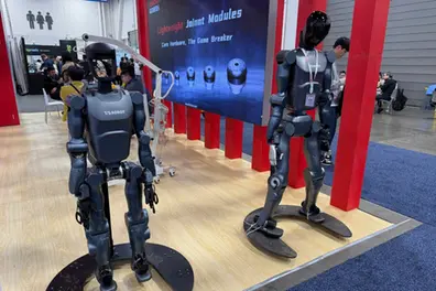 Humanoid robots that cook, play and assist: See the future at CES 2026