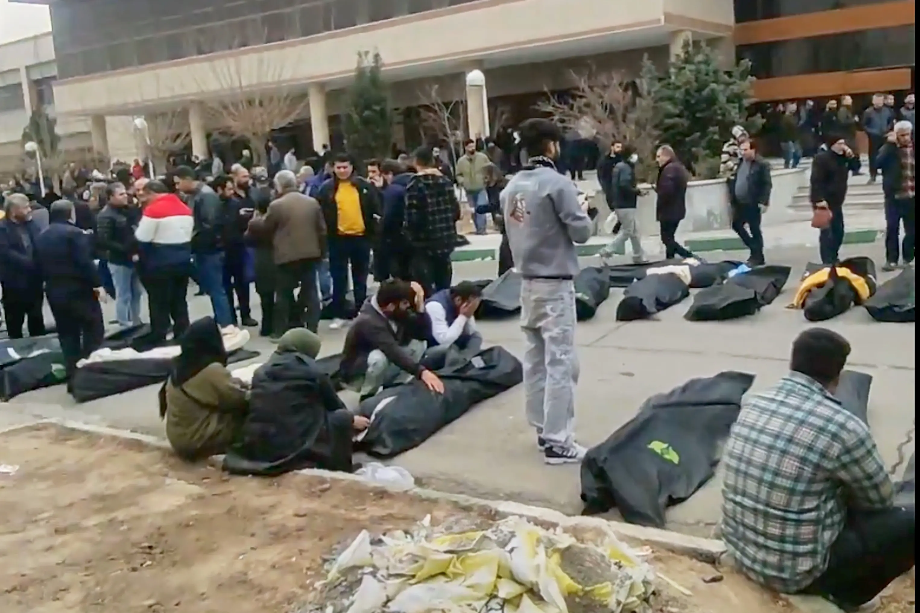 This frame grab from videos taken between Jan. 9 and Jan. 11, 2026, and circulating on social media purportedly shows images from a morgue with dozens of bodies and mourners after crackdown on the outskirts of Iran's capital, in Kahrizak, Tehran Province.| Photo: AP