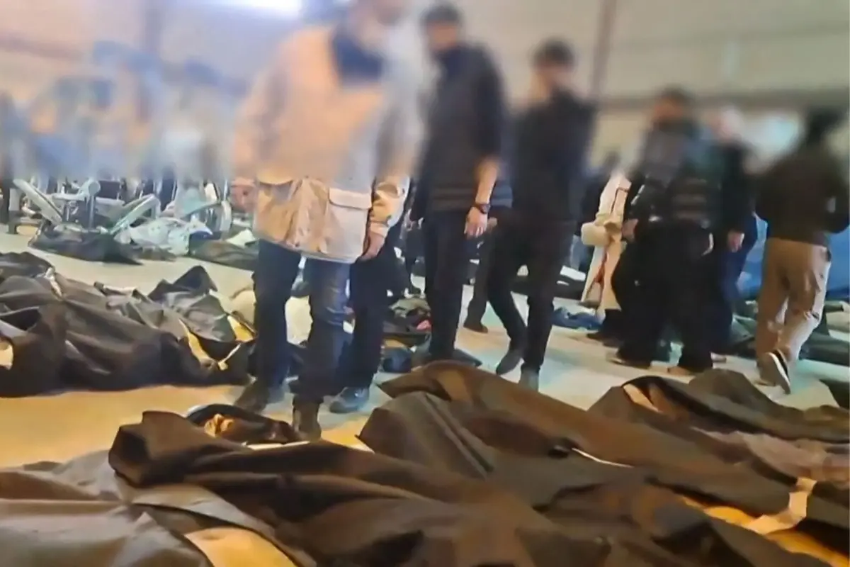 This video grab taken on January 13, 2026 from UGC images posted on social media on January 12, 2026 shows dozens of bodies lying inside the Tehran Province Forensic Diagnostic and Laboratory Centre in Kahrizak | Photo: AFP