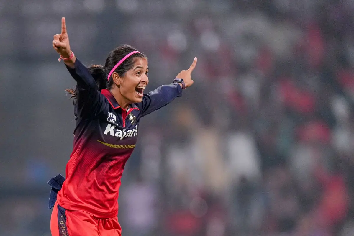Royal Challengers Bengaluru's Shreyanka Patil celebrates after taking the wicket of Gujarat Giants' Tanuja Kanwar during the Women's Premier League (WPL) T20 cricket match between Royal Challengers Bengaluru and Gujarat Giants, at the DY Patil Stadium in Navi Mumbai. | Photo: PTI