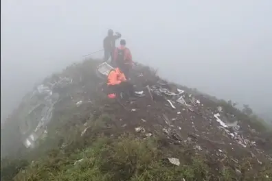 Indonesian plane crash: Wreckage located, 10 passengers still missing