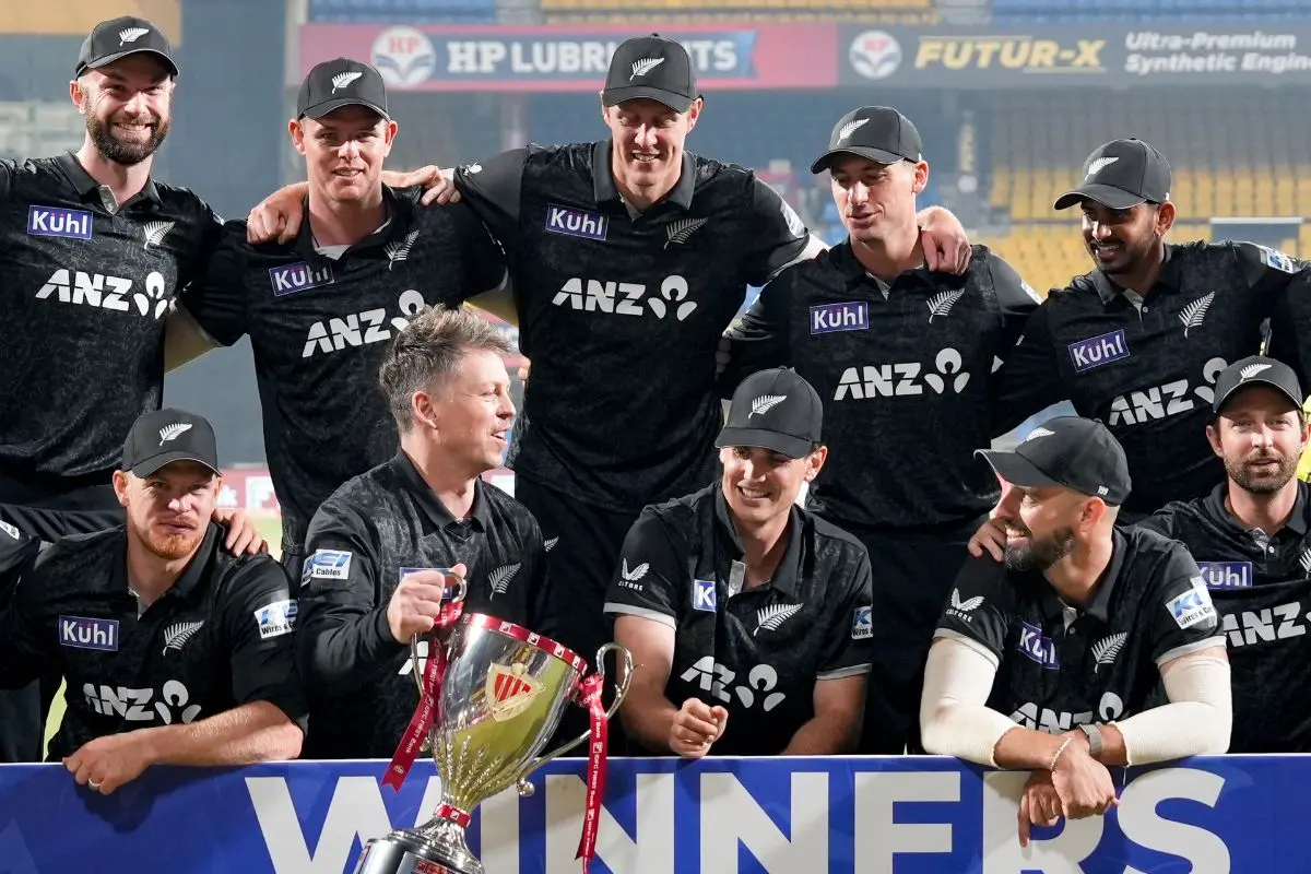 New Zealand's players celebrate with the trophy after winning the 3-match ODI series against India, at Holkar Cricket Stadium, in Indore. (PTI Photo/Atul Yadav)