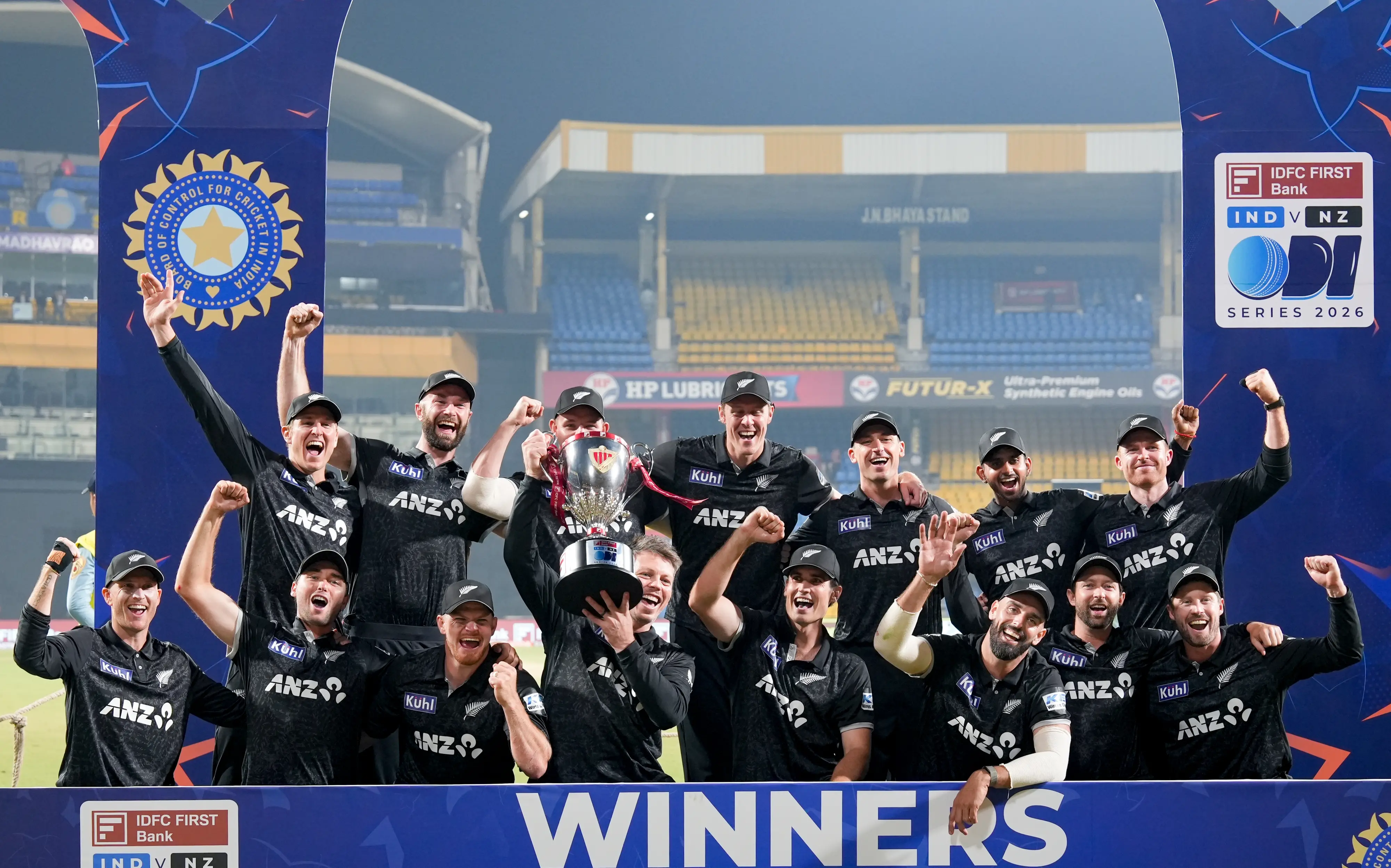 New Zealand's players pose with the trophy after winning the 3-match ODI series against India | Photo: PTI