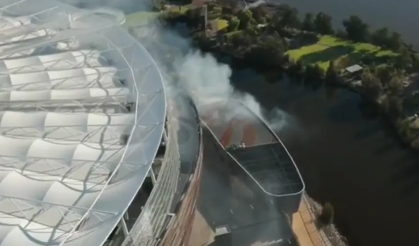 A visual showing smoke outside the Opal Stadium