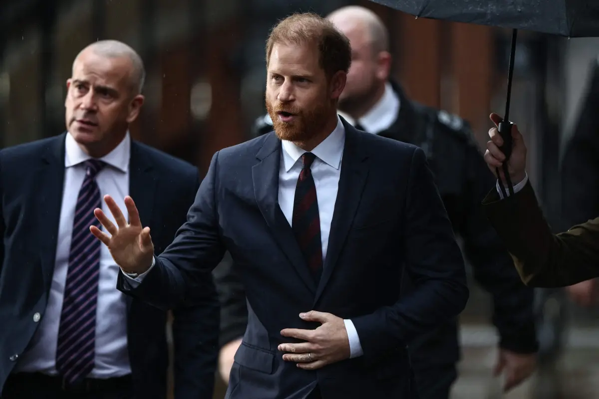 Britain's Prince Harry (C) arrives outside the High Court in London for the third day the trial in his case against a major UK newspaper group. | Photo: AFP