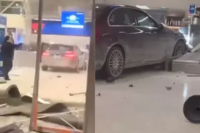 Driver crashes vehicle into Detroit airport terminal, investigation underway | VIDEO