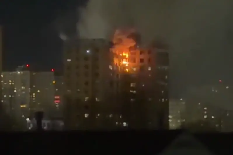 A visual showing the fire at the building