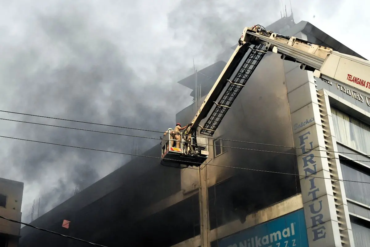 Rescue operation underway after a massive fire breaks out at a furniture shop in Nampally in Hyderabad (ANI Photo)