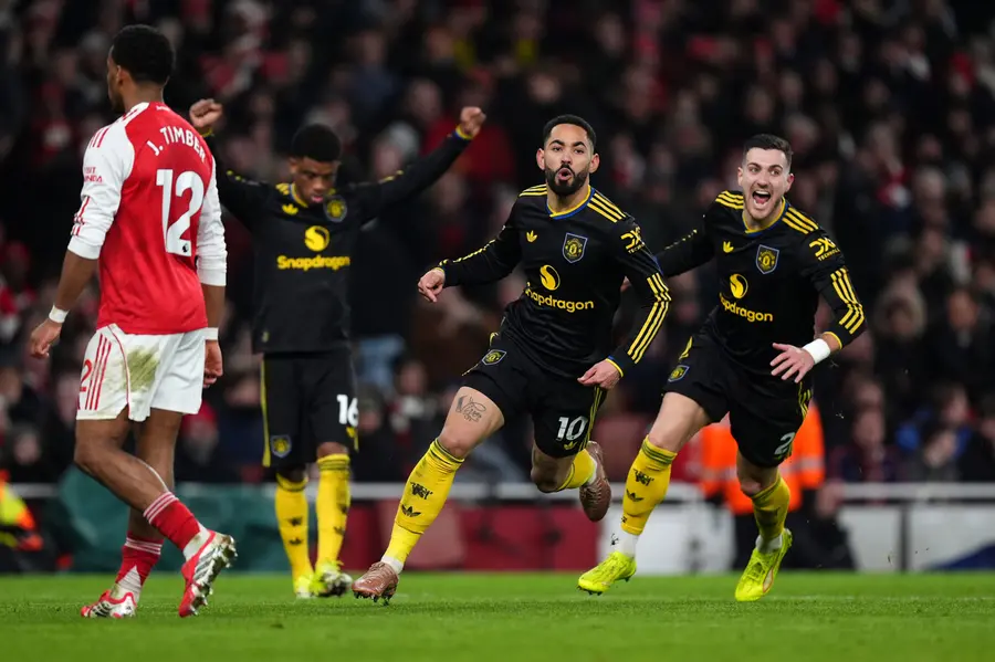 Manchester United's Matheus Cunha celebrates scoring their side's third goal