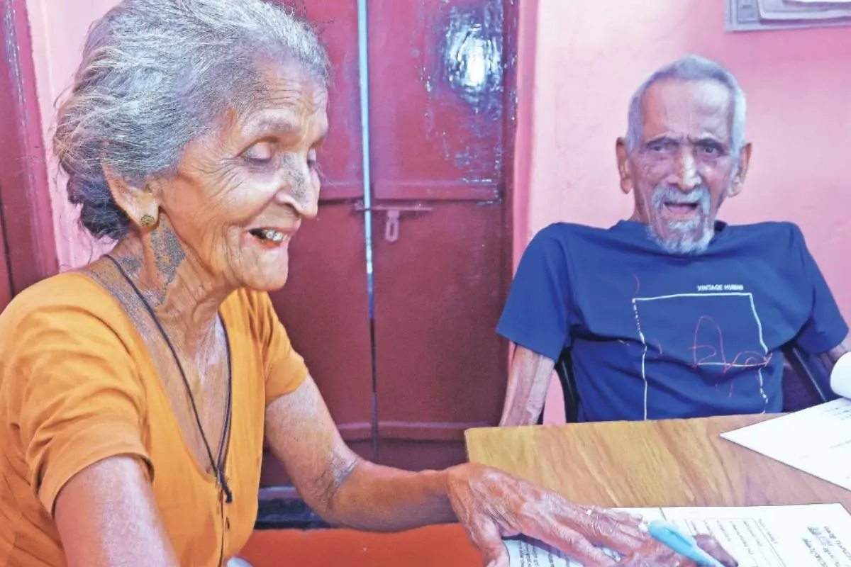 Mani and Lakshmi, a couple from Anappara in Kottakkad, appeared for the literacy examination held on Sunday. Both wrote the exam from their home | Photo: P. P. Ratheesh