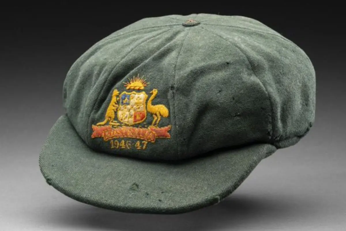 The iconic baggy green cap worn by Sir Don Bradman during the 1947–48 Test series against India, now the most expensive Bradman cap ever sold, fetched a record price at auction after being preserved privately for 75 years.