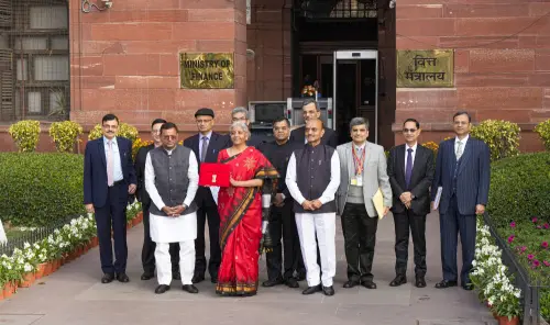 Union Finance Minister Nirmala Sitharaman with Ministers of State Bhagwat Kishanrao Karad and Pankaj Chaudhary and officials poses for photographs outside the Finance Ministry at North Block, in New Delhi, Wednesday, Feb. 1, 2023, ahead of the presentation of the Union Budget 2023-24. Sitharaman will be presenting her fifth Union Budget in Parliament | Photo: PTI