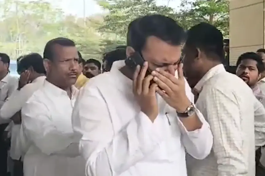 A visual showing Minister Dattatray Vithoba Bharne in tears after learning about the incident
