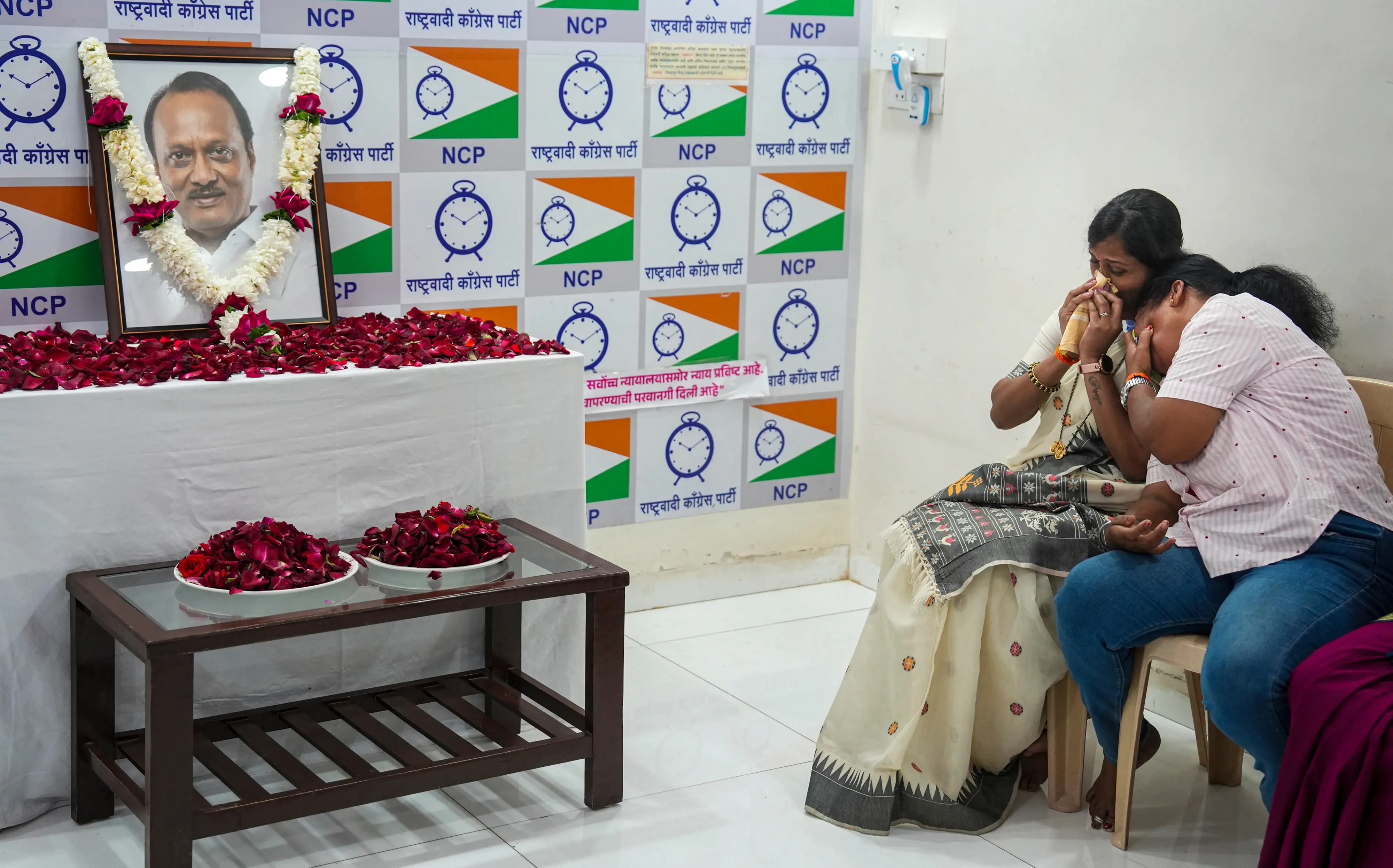 NCP workers mourn the death of party leader and Maharashtra Deputy Chief Minister Ajit Pawar, at the party office in Mumbai | PTI