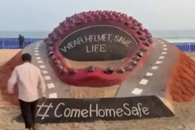 Sand artist Sudarsan Pattnaik creates giant helmet, plastic fish at Odisha’s Gopalpur Beach Festival