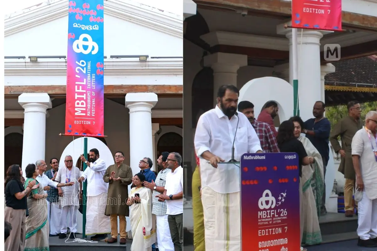 V Sivankutty hoisting MBIFL 2026 festival flag | Photo: Mathrubhumi