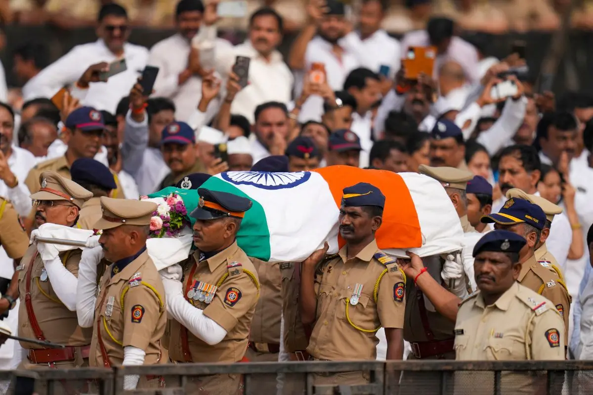 Mortal remains of Maharashtra Deputy Chief Minister Ajit Pawar being brought to Vidya Pratishthan college ground for his funeral, at Baramati in Pune district, Thursday, Jan. 29, 2026. (PTI Photo/Kunal Patil)