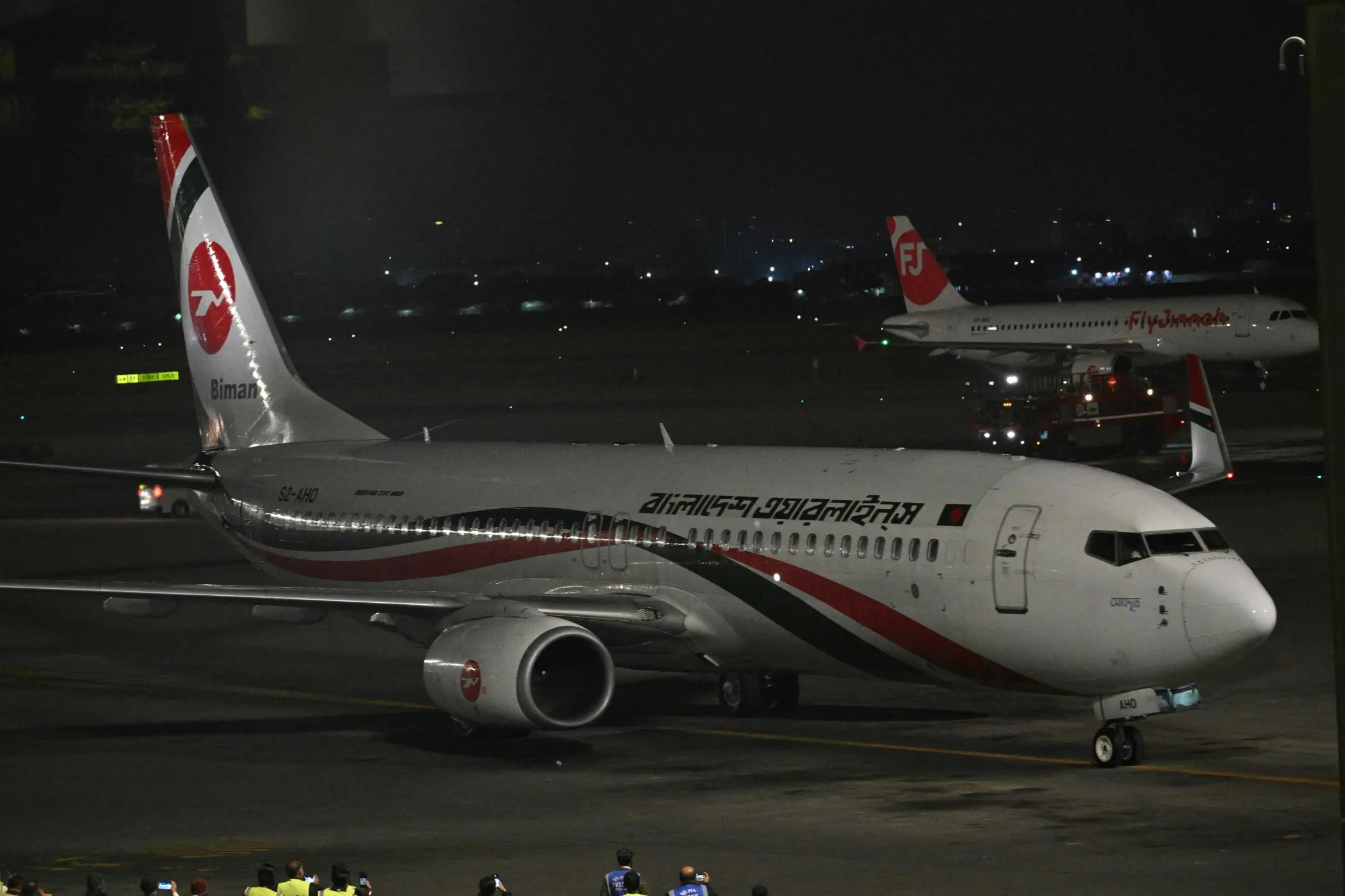 A plane of Biman Bangladesh Airlines is seen after landing at Jinnah International Airport in Karachi on January 30, 2026 | Photo: AFP