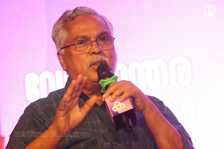 CPI Kerala State Secretary Binoy Visvam interacting with D. Pramesh Kumar during a session titled 'Who is Binoy Visvam?' at the Mathrubhumi International Festival of Letters