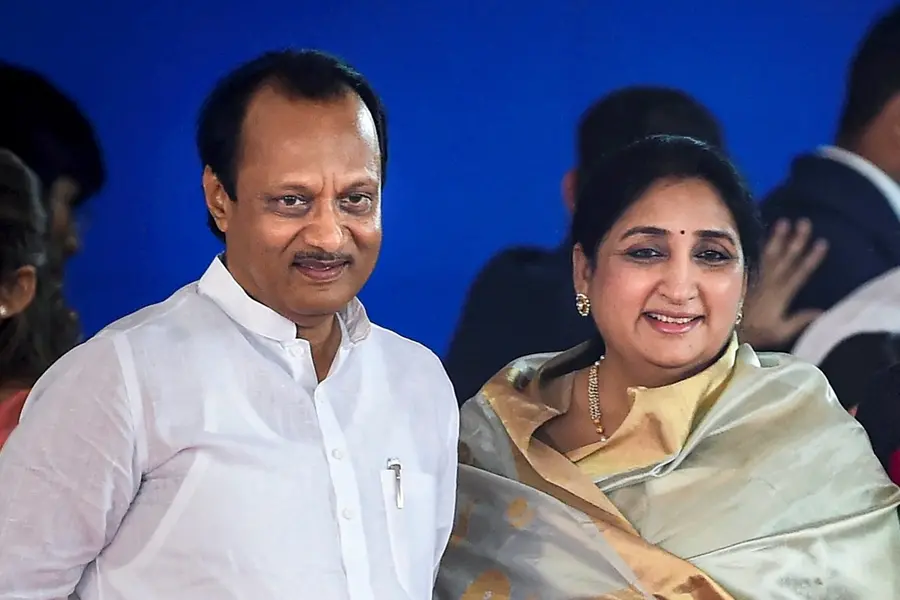NCP leader Ajit Pawar with wife and party leader Sunetra Pawar