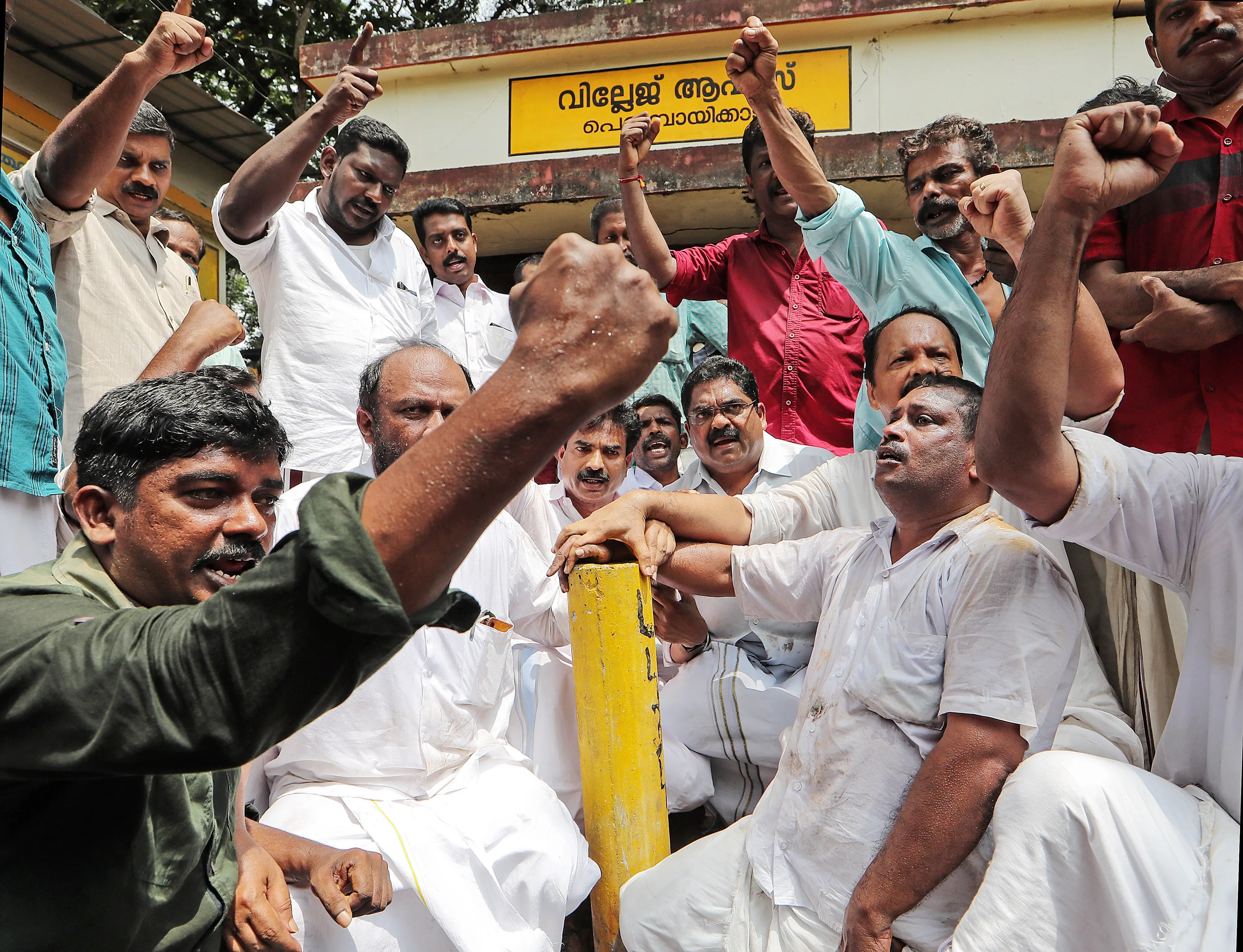 People protest around a yellow marker against the SilverLine project | File Photo: Mathrubhumi