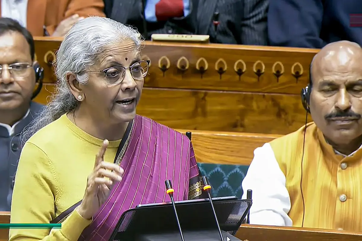 Finance Minister Nirmala Sitharaman presents the 'Union Budget 2026-27' in the Lok Sabha, in New Delhi, Sunday, Feb. 1, 2026. (Sansad TV via PTI Photo)